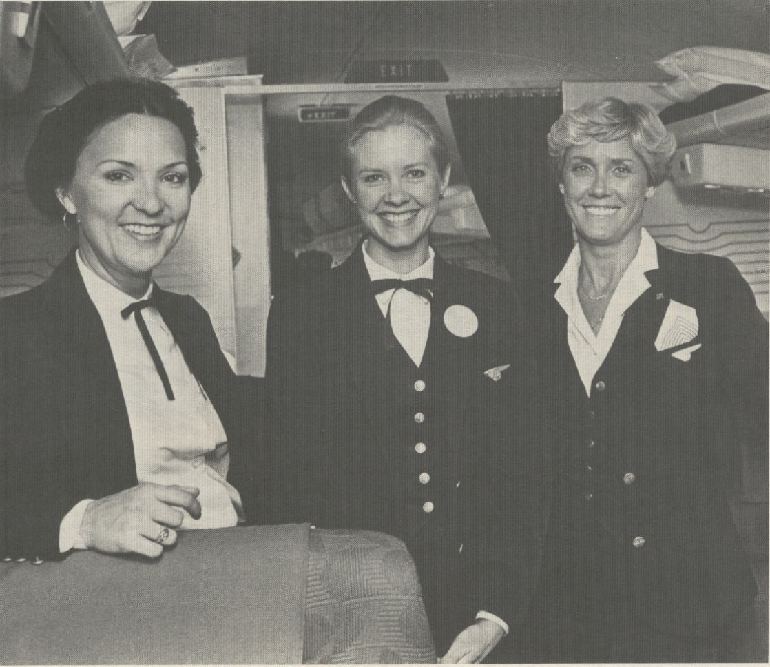 1981 Three Pan Am flight attendants pose in the first class cabin of a Boeing 727.